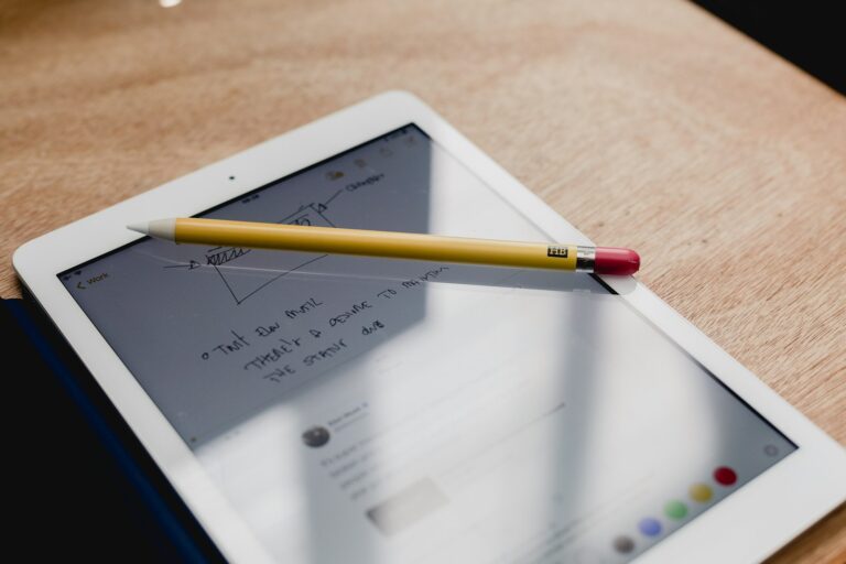 smart pen on turned-on tablet